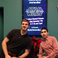 <p>Teaneck Cinemas Manager David Rozeen, left, and Pablo ready for the &quot;Star Wars&quot; advanced screenings.</p>