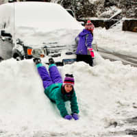 <p>Kids enjoying snow banks on Marathon Place in Port Chester.</p>