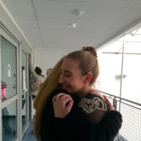 <p>Juliet Melotto hugs her mother, Jody Melotto, after passing her senior freestyle test at The Rinks at Shelton. Melotto is a member of the Laurel Ridge Skating Club.</p>