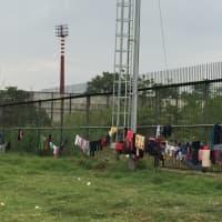 <p>Clothes hang to dry at the refugee camps.</p>