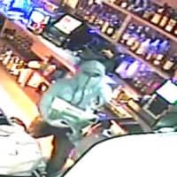 <p>Stratford police released this surveillance camera photo of the suspect in the armed robbery and shooting of a bartender at BAR last.</p>