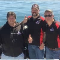 <p>Squalus Technical Advisor John Morgan, Captain Denis Habza and Dive Safety Officer Joe Lockridge prepare to make another underwater video.</p>