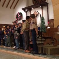 <p>Hasbrouck Heights Cub Scouts line up at the start of the Peace Light Ceremony Friday night.</p>