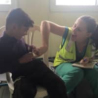 <p>Kelly Griffin &quot;pokes fun&quot; at a patient.</p>
