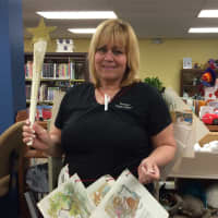 <p>Denise Carrozza, children&#x27;s librarian, dressed as the book fairy to promote reading. </p>