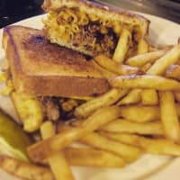 <p>Kyle&#x27;s pulled-pork finds a loving home inside of a macaroni and cheese sandwich.</p>