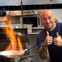 <p>Food blogger and Harrison firefighter A.J. Fusco, shown cooking up a storm, came away a winner from a recent Food Network competition, according to Harrison Mayor Ron Belmont.</p>