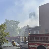 <p>Firefighters on scene of a large blaze in Jersey City.</p>