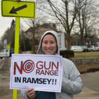<p>Demonstrators stood on North Central Avenue in Ramsey to raise awareness about a pending gun range.</p>
