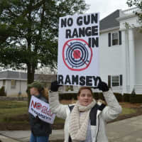 <p>Demonstrators waved their signs at passing motorists in Ramsey Wednesday morning.</p>