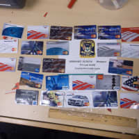 <p>The fraudulent credit cards police said they found on two men during a traffic stop in Westport.</p>
