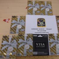 <p>Stolen gift cards that police said they found on two men during a traffic stop in Westport.</p>