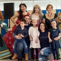 <p>Gia Gentile rocks a &quot;diamond&quot; tiara as she stands with her parents, Dana and Carmine, siblings, and powerful princess friends at a fundraiser for pediatric cancer research in Mount Pleasant Saturday.</p>