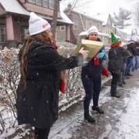 <p>Volunteers joined together to deliver toys.</p>