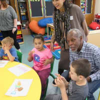 <p>Actor and activist Danny Glover visits with children at The Hilltop School in Haverstraw earlier this week. He spoke of growing up with dyslexia and signed autographs for all the kids.</p>