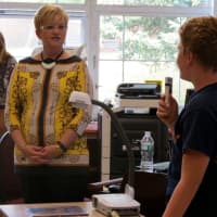 <p>Principal Nadine McDermott takes question from a student during session about Golden Rule of Todd School.</p>