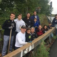 <p>Members of several community groups and individual volunteers worked for hours recently to clear weeds and brush from a pedestrian walkway in Goldens Bridge.</p>