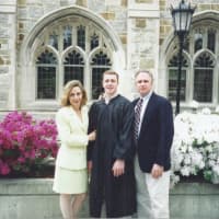 <p>A graduation photo of Upper Nyack resident Welles Crowther flanked by his parents, Alison and Jefferson.</p>