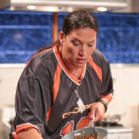 <p>Ossining&#x27;s Gina Paterno Gray plates food while competing in the Tailgate Greats segment of the Food Network show &quot;Chopped&quot; earlier this month.</p>