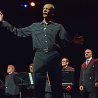 <p>The Men&#x27;s Community Gospel Choir of Norwalk, led by Greg Detroy, sings gospel and civil rights selections during the performance. Pictured is Greg Thornewell, with members of the choir.</p>