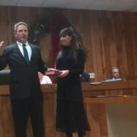 <p>Demarest Councilman Gregg Paster was sworn in to a new term as councilman Monday night in the Borough Hall, with his wife holding the Bible.</p>
