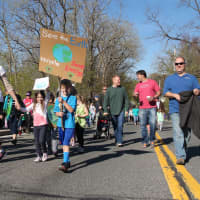 <p>Students, staff and parents crowded Chelsea Street as they marched from the school to the Hawthorne Fire Department.</p>