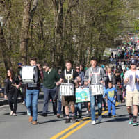 <p>Green Walk Band marches in parade.</p>