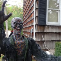 <p>Dennis Morton&#x27;s Waldwick yard is decorated with many human-sized figures like monsters and zombies.</p>
