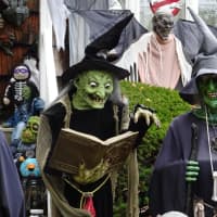 <p>Witches are among the scary life-sized figures that speak and move at a Waldwick house.</p>