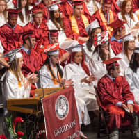 <p>Senior Class President Gina Di Russo, who plans to attend Georgetown University in the fall, speaks before Harrison High School&#x27;s commencement.</p>