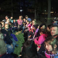 <p>Parents and children waiting for the haunted hayride to begin.</p>