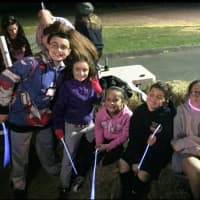 <p>Matthew, Nina, Samantha, Joe and Jacqueline wait for a ride on the haunted hayride at Hasbrouck Heights 2015 Halloween in the Park.</p>