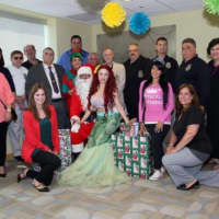<p>Staff and volunteers at the Joseph M. Sanzari Children’s Hospital.gather to celebrate Christmas in July with the children.</p>