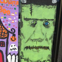 <p>Kids painted the windows of storefronts with Halloween images.</p>