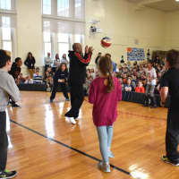 <p>F.E. Bellows Elementary School students interacted with Arnold “A-
Train” Bernard, an accomplished trickster and member of the Harlem Wizards.</p>
