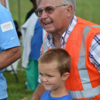 <p>An instructor looks on at last year&#x27;s event in Haverstraw as a young boy takes a turn at the controls.</p>