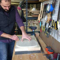<p>Henry D&#x27;Allacco crafts each instrument by hand at Grosbeak Guitars.</p>