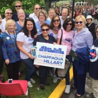 <p>Hillary Clinton poses for a photo with a group of local supporters in downtown Chappaqua.</p>