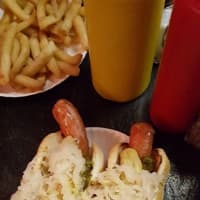 <p>Two dogs with relish, sauerkraut and mustard at Hiram&#x27;s Roadstand in Fort Lee.</p>