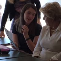 <p>Holy Child Grandparents Day chair Barbara Santangelo of Rye attends class with her granddaughter Lila Pfohl.</p>