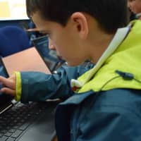 <p>Rye Neck middle school and high school students collaborated during the Hour of Code.</p>