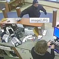 <p>An alleged Hyde Park bank robber is still at large. Did you see anything?</p>