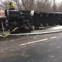 <p>A stretch of I-84 in Dutchess remains closed around noontime following an early morning rollover collision involving a tractor-trailer Tuesday.</p>