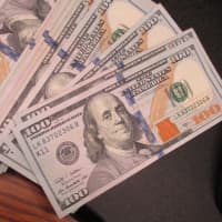<p>Police have asked the public for information after a 75-year-old man sent more than $8,000 in cash to a Long Island home because he was targeted by scammers.</p>
