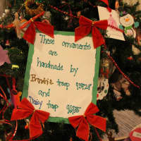 <p>Girl Scouts decorated their tree with festive handmade ornaments.</p>
