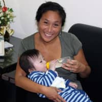 <p>Linie Rand feeds her baby, Jake, in 2011. Linie and her husband, Joe, adopted the now 5-year-old boy from Taiwan.</p>