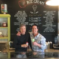 <p>Cousins and business owners Mike Pietrunti and Dennis Rotunno at the Uncle Louie G ice cream franchise they opened this winter on the Trumbull Long Hill Green.</p>