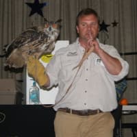 <p>Evers with the Eurasian Eagle Owl named Tiaga</p>