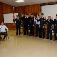 <p>Mahopac Falls Fire Department members take the oath.</p>