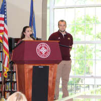 <p>Iona College SGA President Kayla Kosack and water polo captain Hudson Grieve issued Lt. Gov. Kathy Hochul a gift bag before introducing her.</p>